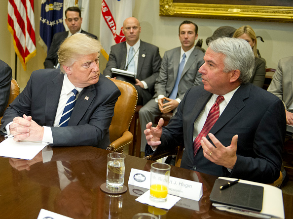 President Donald Trump listens to Bob Hugin, executive chairman of the Celgene Corp., during a meeting with representatives from the Pharmaceutical Research and Manufacturers of America at the White House on Jan. 31, 2017 in Washington, DC.