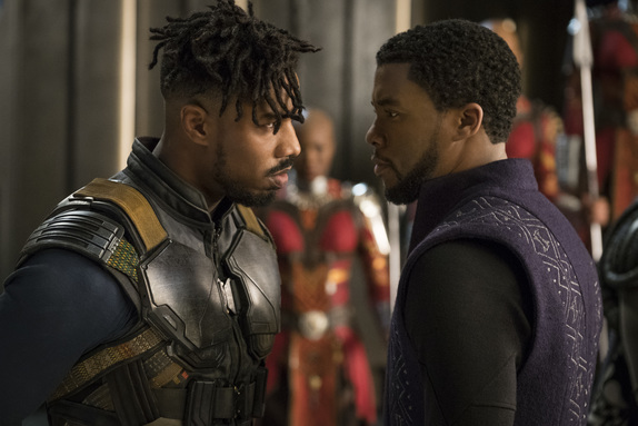Michael B. Jordan as Erik Killmonger and Chadwick Boseman as Black Panther.