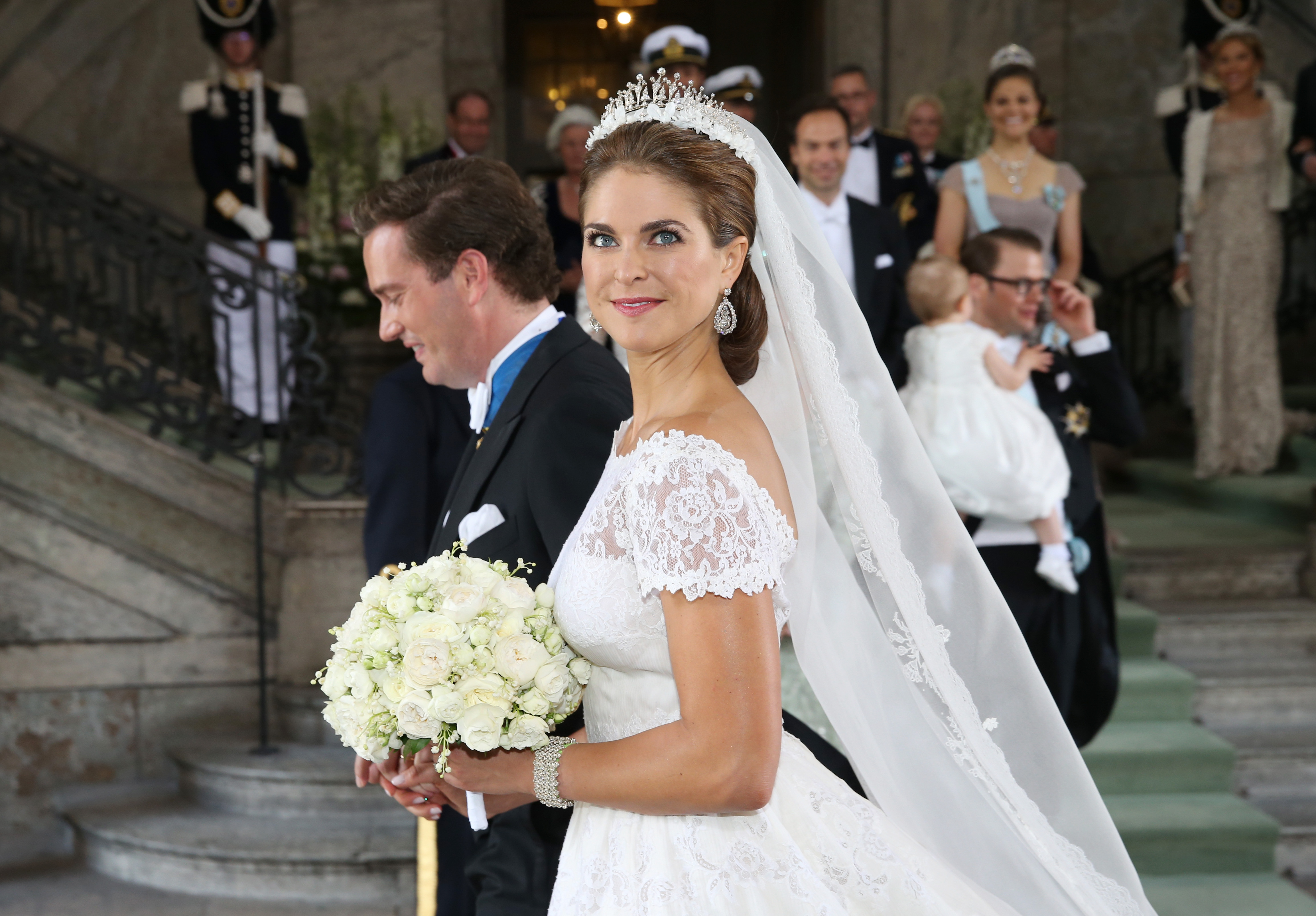 STOCKHOLM, SWEDEN - JUNE 08: Princess Madeleine of Sweden and Christopher O'Neill depart from the wedding ceremony of Princess Madeleine of Sweden and Christopher O'Neill hosted by King Carl Gustaf XIV and Queen Silvia at The Royal Palace on June 8, 2013 in Stockholm, Sweden. 