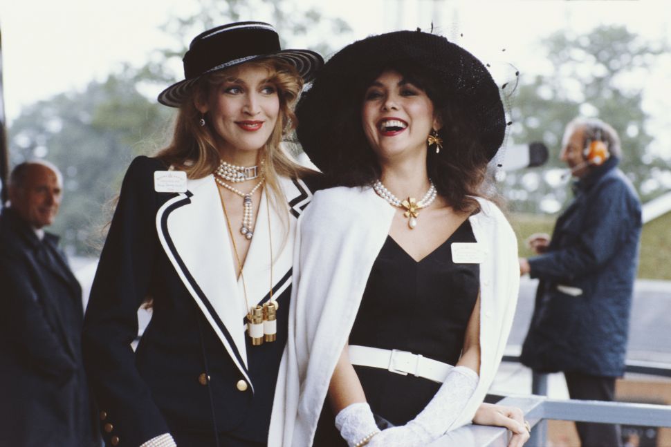 1982: Hawaiian born model, Marie Helvin, with the American model and wife of Mick Jagger, Jerry Hall, at Royal Ascot. (Photo by Hulton Archive/Getty Images)