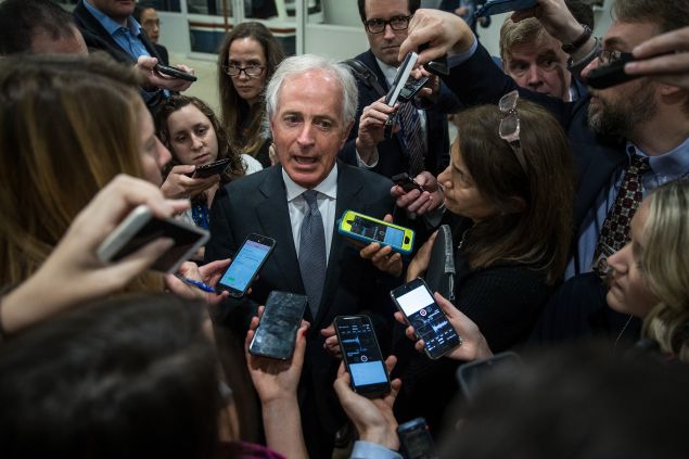 Sen. Bob Corker (R-TN) talks to reporters as he heads to a vote on amendments to the fiscal year 2018 budget resolution, on Capitol Hill, October 19, 2017 in Washington, DC.
