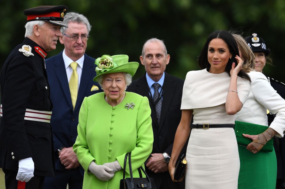 Queen Elizabeth II and Meghan, Duchess of Sussex arrive to open the new Mersey Gateway Bridge on June 14, 2018 in the town of Widnes in Halton, Cheshire, England. Meghan Markle married Prince Harry last month to become The Duchess of Sussex and this is her first engagement with the Queen. During the visit the pair will open a road bridge in Widnes and visit The Storyhouse and Town Hall in Chester. (Photo by Jeff J Mitchell/Getty Images)