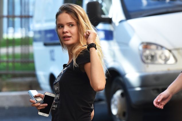 Member of the Pussy Riot punk group Veronika Nikulshina arrives for a court hearing at a courthouse in Moscow, on July 31, 2018, as members of the Russian protest-art group are accused of disturbing public order after invading the pitch during the World Cup final in Moscow. Russian police on July 30 detained four members of the Pussy Riot punk group immediately after they were released from custody.