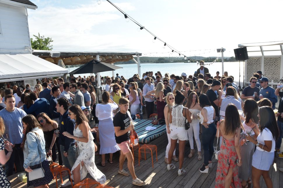 Partygoers gather at the ultra-trendy Surf Lodge.