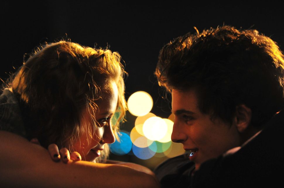 Maika Monroe and Timothée Chalamet in Elijah Bynum’s feature debut, “Hot Summer Nights.”