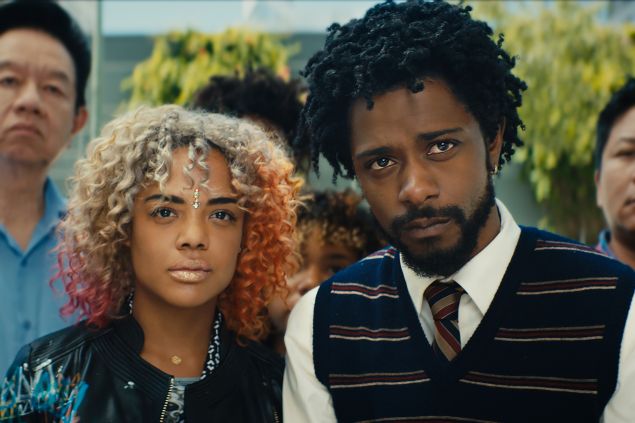 Tessa Thompson as Detroit and Lakeith Stanfield as Cassius Green in Sorry to Bother You.