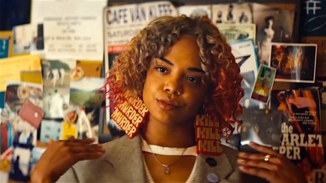 Tessa Thompson as Detroit wearing earrings that read 'murder' and 'kill' in Sorry to Bother You.