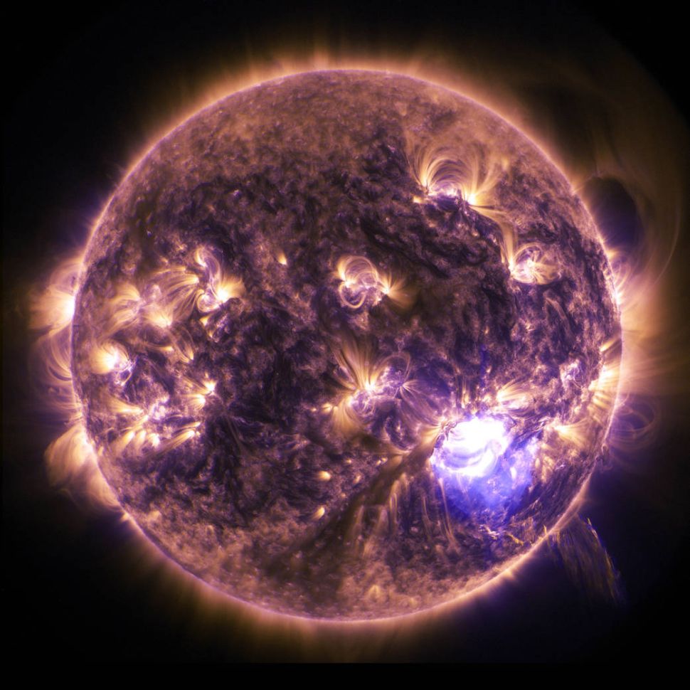 The sun emitted a significant solar flare, peaking at 7:28 p.m. EST on Dec. 19, 2014.