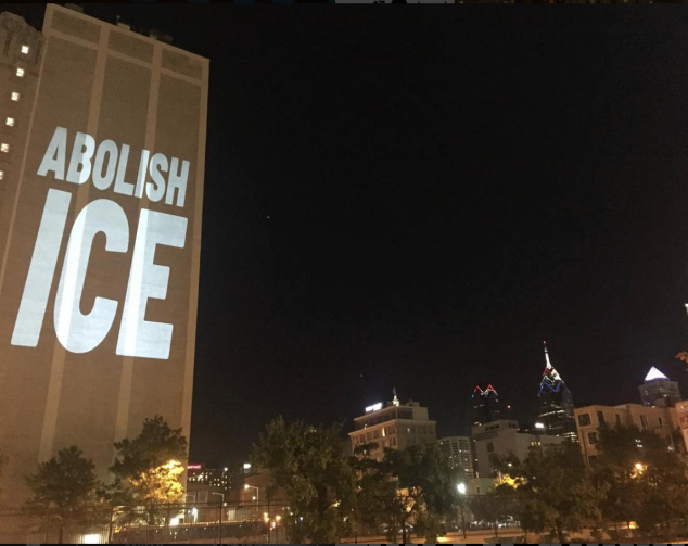 The Illuminator projects 'Abolish Ice' in Philadelphia.