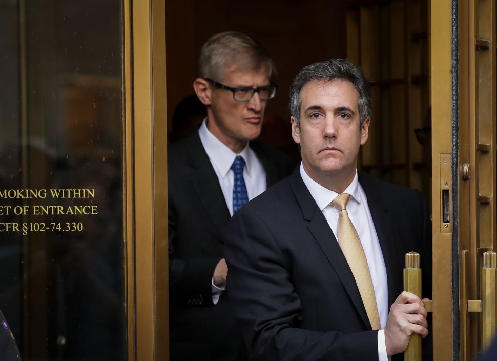 Michael Cohen, President Donald Trump's former personal attorney and fixer, exits federal court.