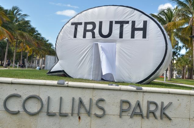 In Search of Truth by Hank Willis Thomas, Ryan Alexiev and Kim Ricks on display during Art Basel Miami Beach 2014.