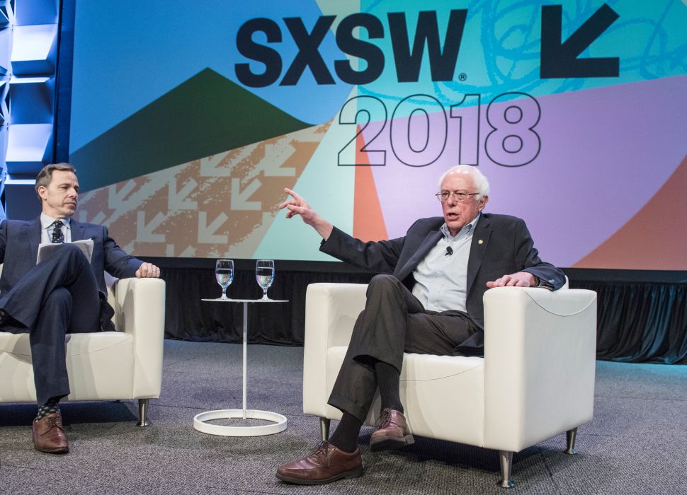 CNN Anchor Jake Tapper interviews Vermont Senator Bernie Sanders during SxSW Interactive.