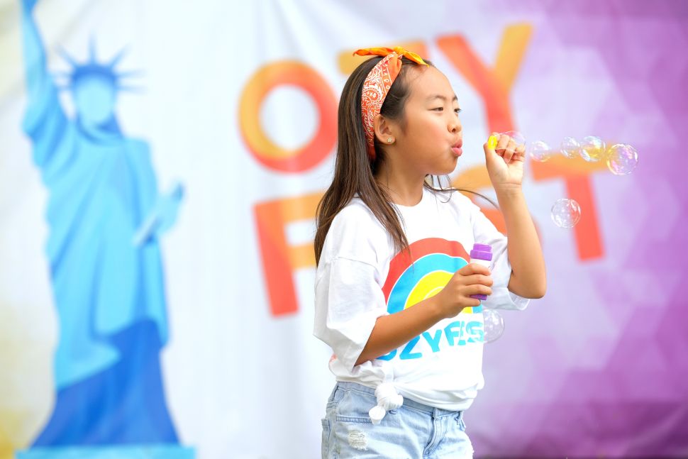 Ozy Fest in Central Park attracts tourists blowing bubbles, but Ozy prefers to blow raspberries at other media outlets.