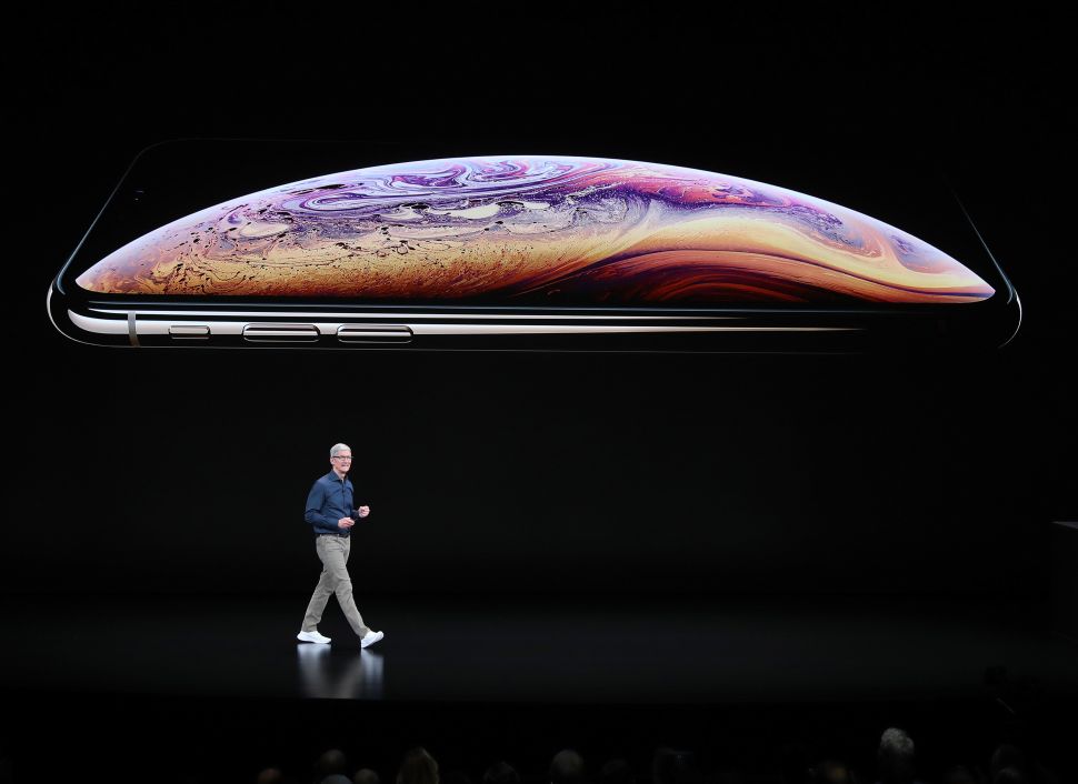 Tim Cook debuted three new iPhones at Apple's annual launch event on Wednesday. 