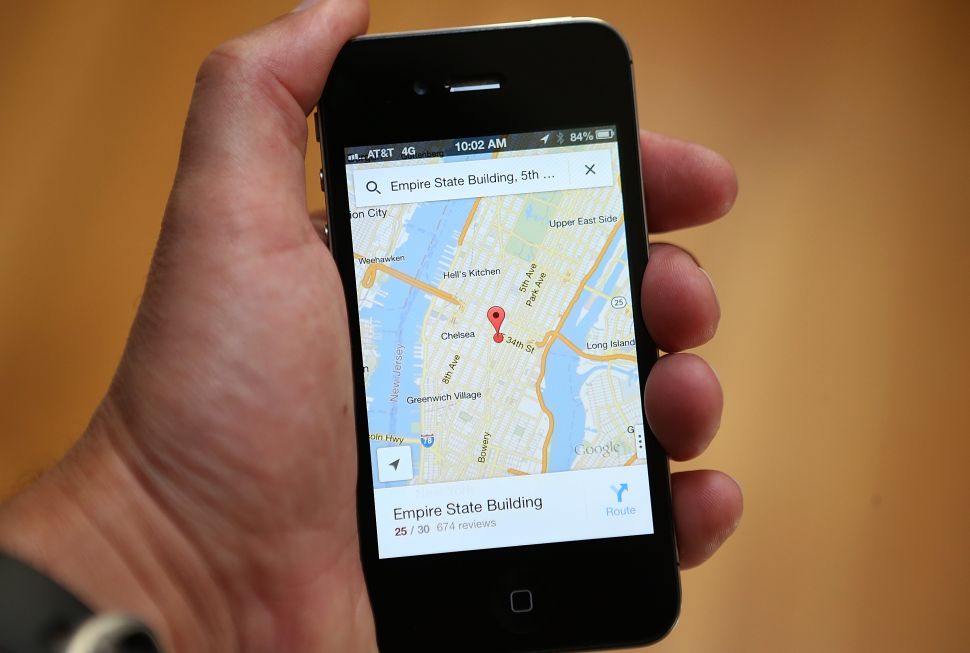 The Google Maps app is seen on an Apple iPhone 4S.