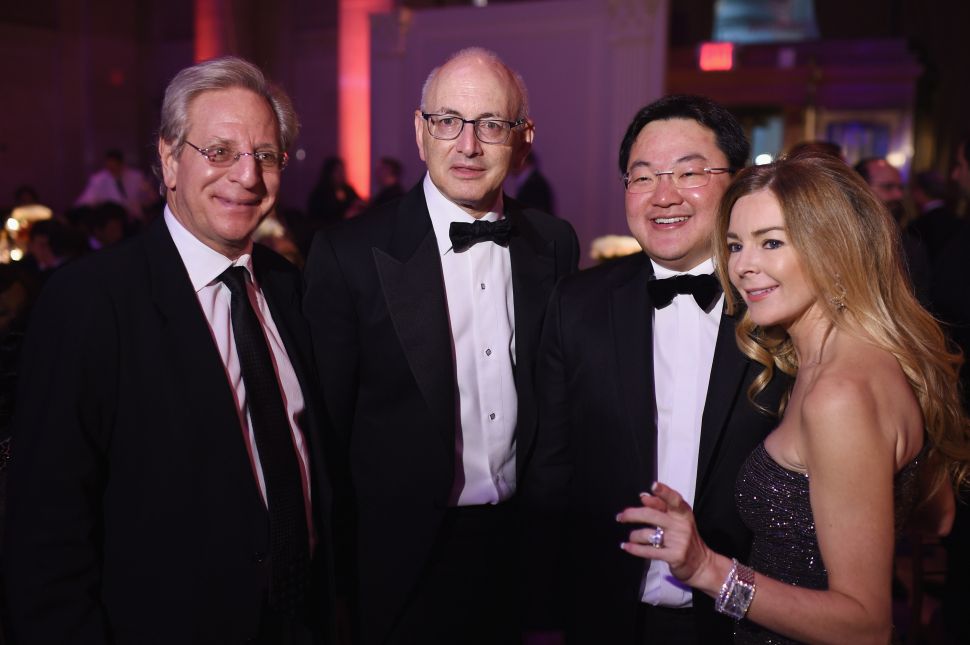 Jho Low (2nd R) and guests attend Angel Ball 2014 hosted by Gabrielle's Angel Foundation at Cipriani Wall Street on October 20, 2014 in New York City.