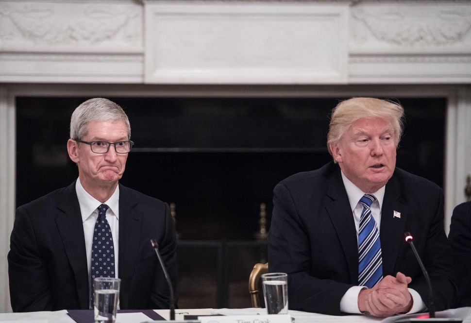 Apple CEO Tim Cook had dinner with President Trump one month before Apple's product launch. 