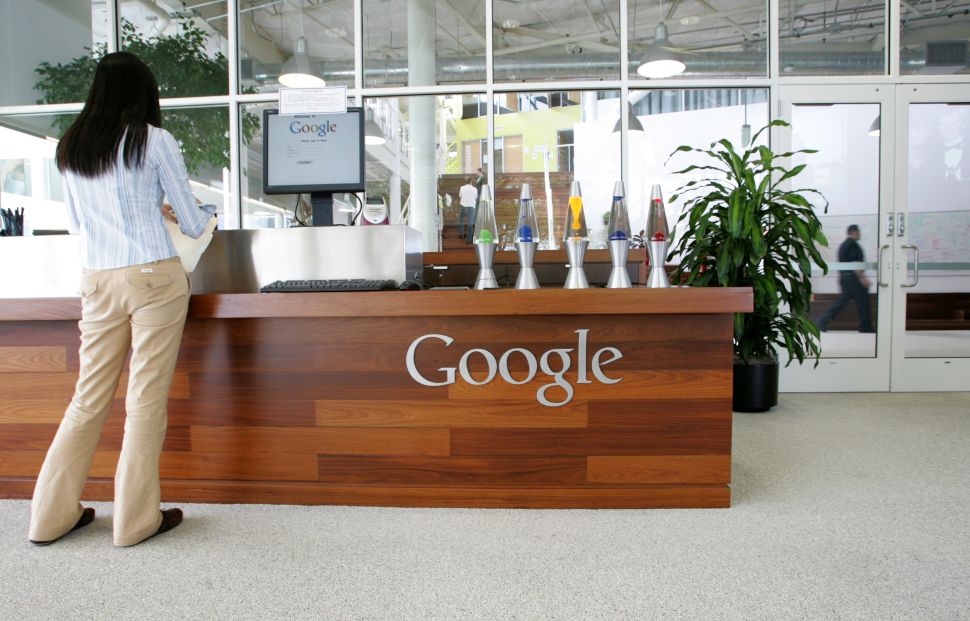 A Google employee stands in a lobby at the Googleplex in Mountain View, California.