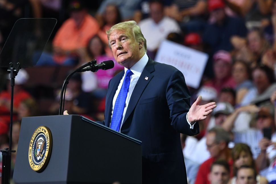 Did President Donald Trump mock Christine Blasey Ford at a rally? There was a vigorous debate on both sides on the Bernie and Sid show this morning.
