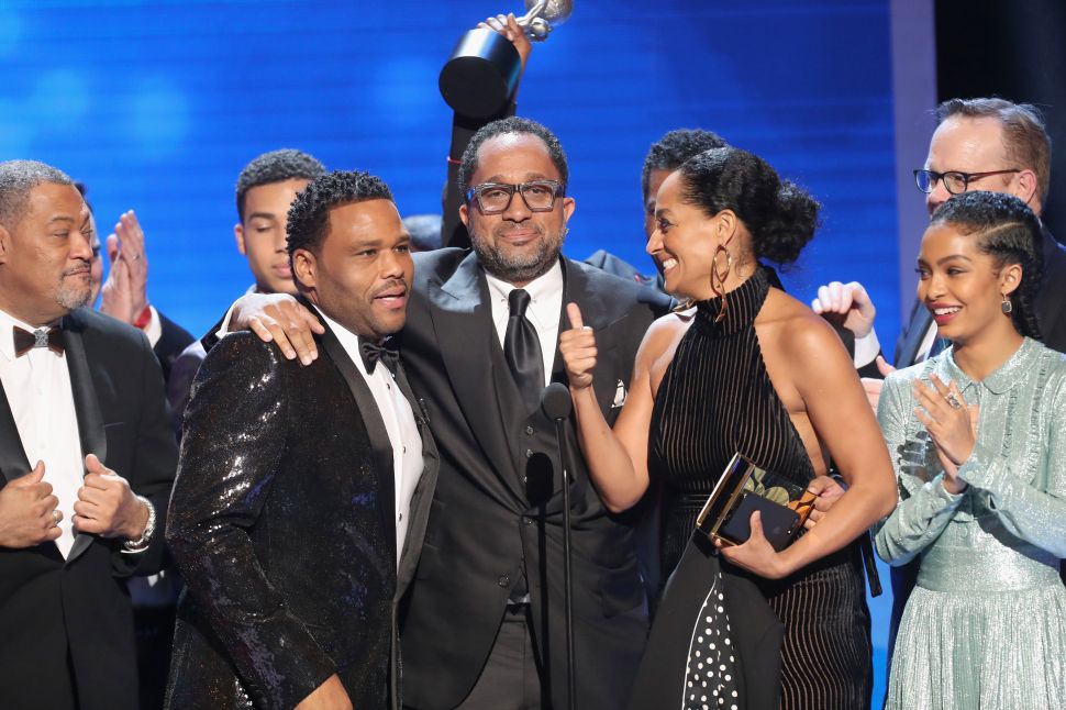 Co-recipients Laurence Fishburne, Anthony Anderson, Kenya Barris, Tracee Ellis Ross and Yara Shahidi accept the award for Outstanding Comedy Series 'Black-ish' on-stage at the 48th NAACP Image Awards.