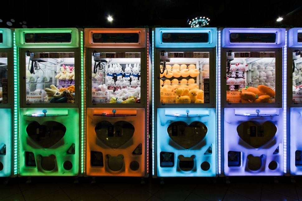 UFO catchers, also known as crane games, only have two prongs, claw machines have three.