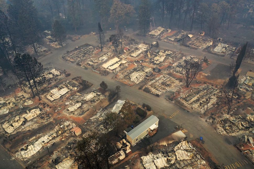 An aerial view of a neighborhood destroyed by the Camp Fire on November 15, 2018 in Paradise, California.