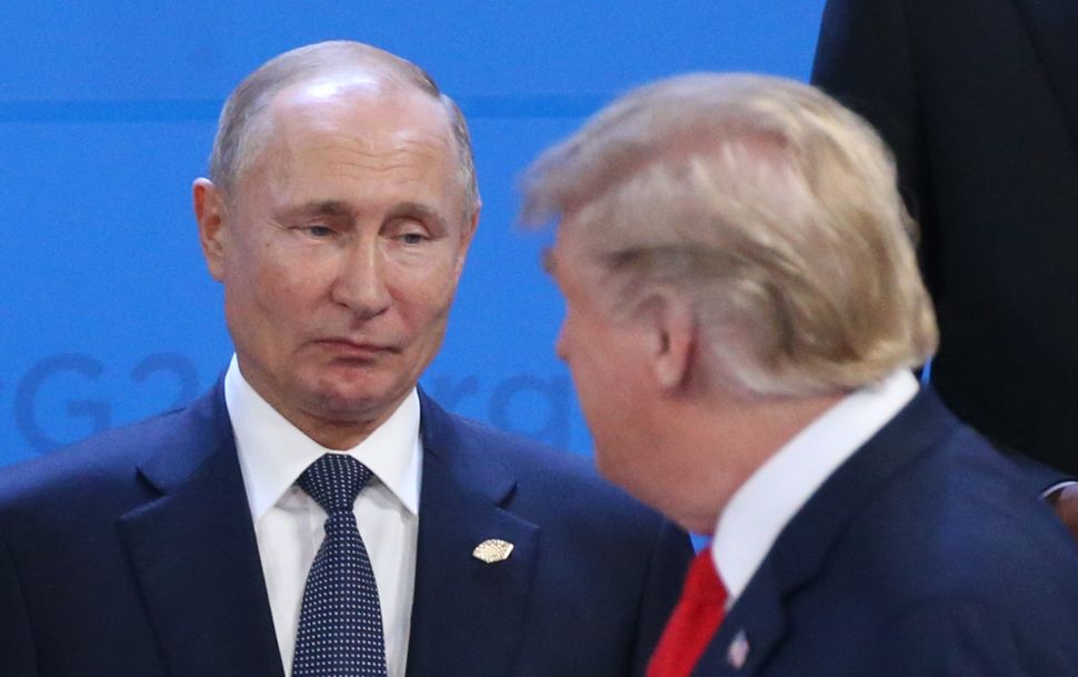 Putin and Trump at the G20 Summit welcoming ceremony on November 30, 2018 in Buenos Aires, Argentina.