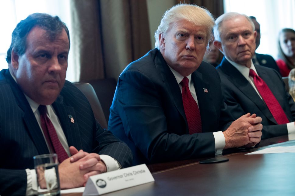 U.S. President Donald Trump (C), New Jersey Gov. Chris Christie (L) and Attorney General Jeff Sessions (R) attend a panel discussion on an opioid and drug abuse in the Roosevelt Room of the White House March 29, 2017 in Washington, DC.