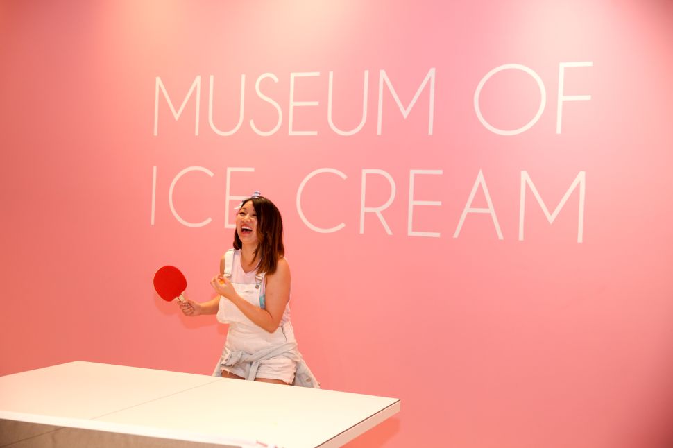 Visitors play ping pong during the Museum of Ice Cream's opening party on September 15, 2017 in San Francisco, California.