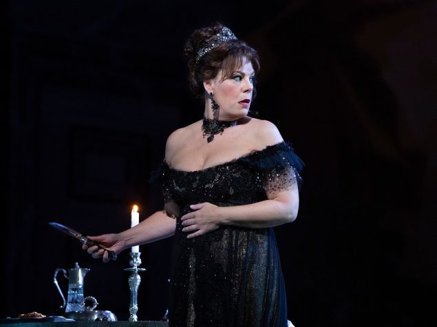 Soprano Sondra Radvanovsky goes into the windup for a sensational moment in Puccini's "Tosca'/