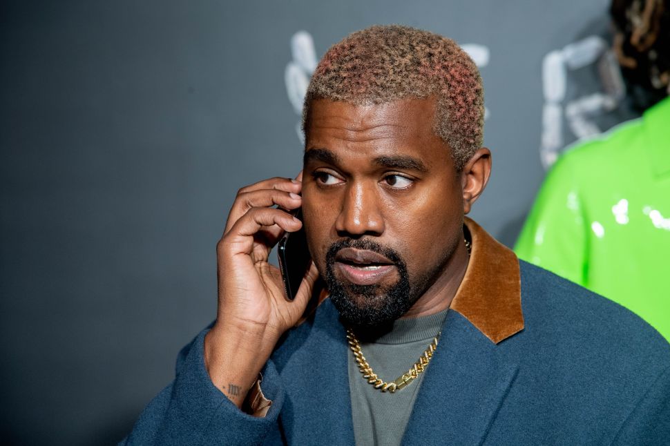 Kanye West attends the the Versace fall 2019 fashion show.