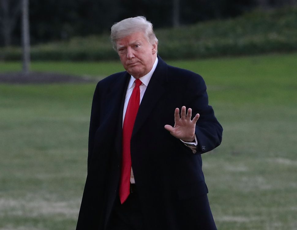 President Trump arrives back at the White House on December 7, 2018.