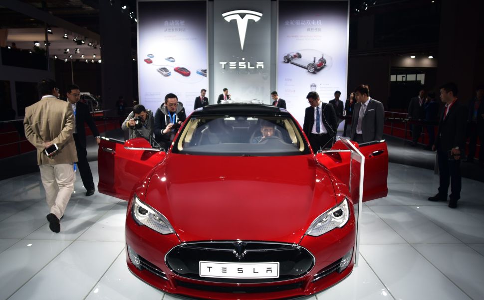 A Tesla Model S car on display at the 16th Shanghai International Automobile Industry Exhibition in Shanghai on April 20, 2015.