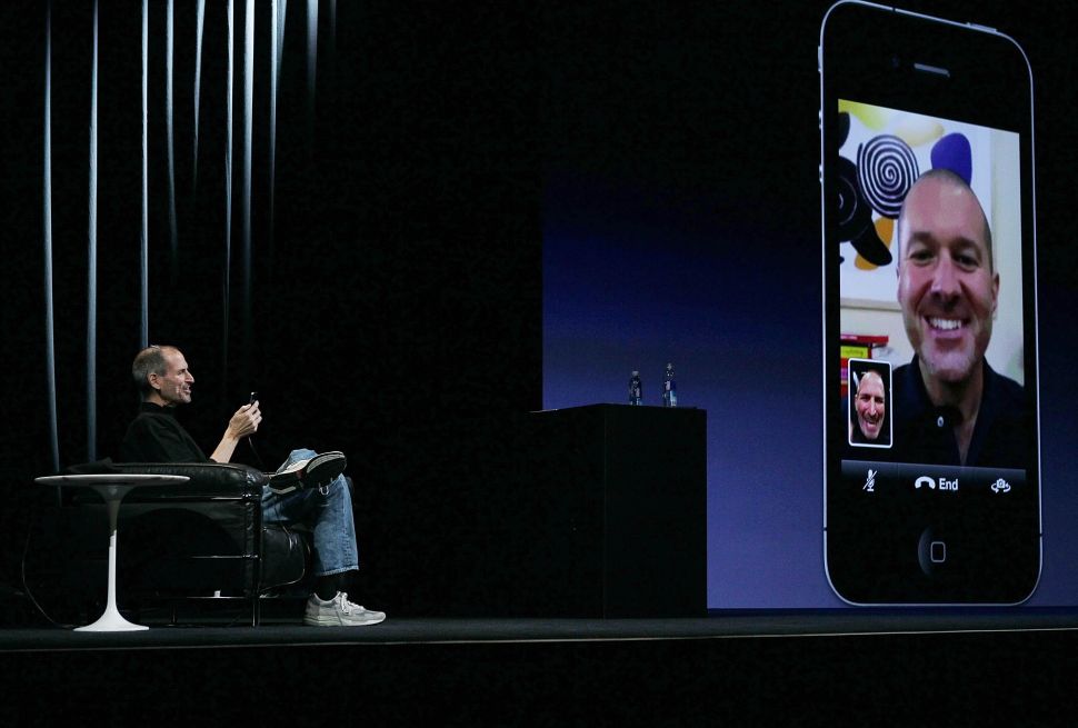 Former Apple CEO Steve Jobs demonstrates FaceTime video conferencing on an iPhone 4 at the 2010 Apple World Wide Developers conference.
