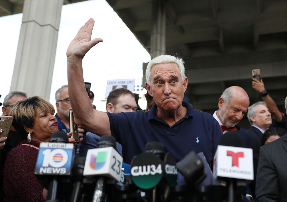 Roger Stone courts media after his arrest.