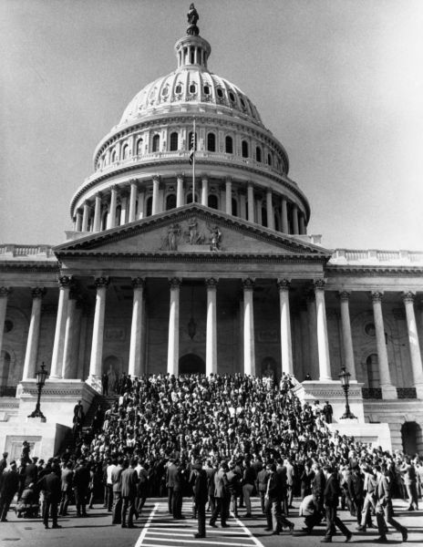 Anti-war demonstrators fill the steps of the United States Capitol Building on the day of the National Moratorium, on October 15, 1969.