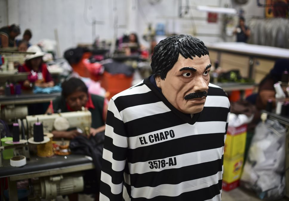 A costume and a mask representing Mexican drug trafficker El Chapo.