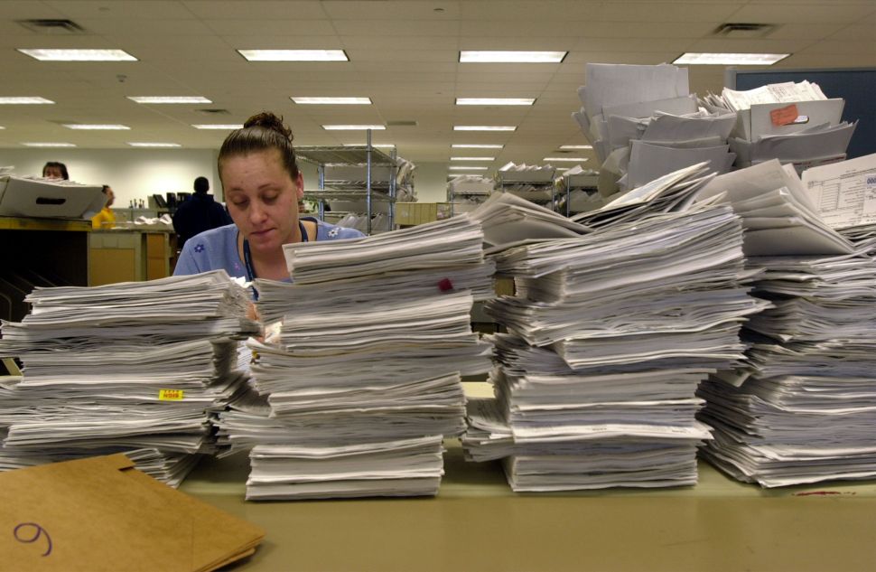 A typical IRS employee processes 50 tax return filings a day.
