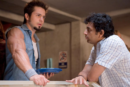 Freddy Rodríguez and M. Night Shyamalan in Lady in the Water.