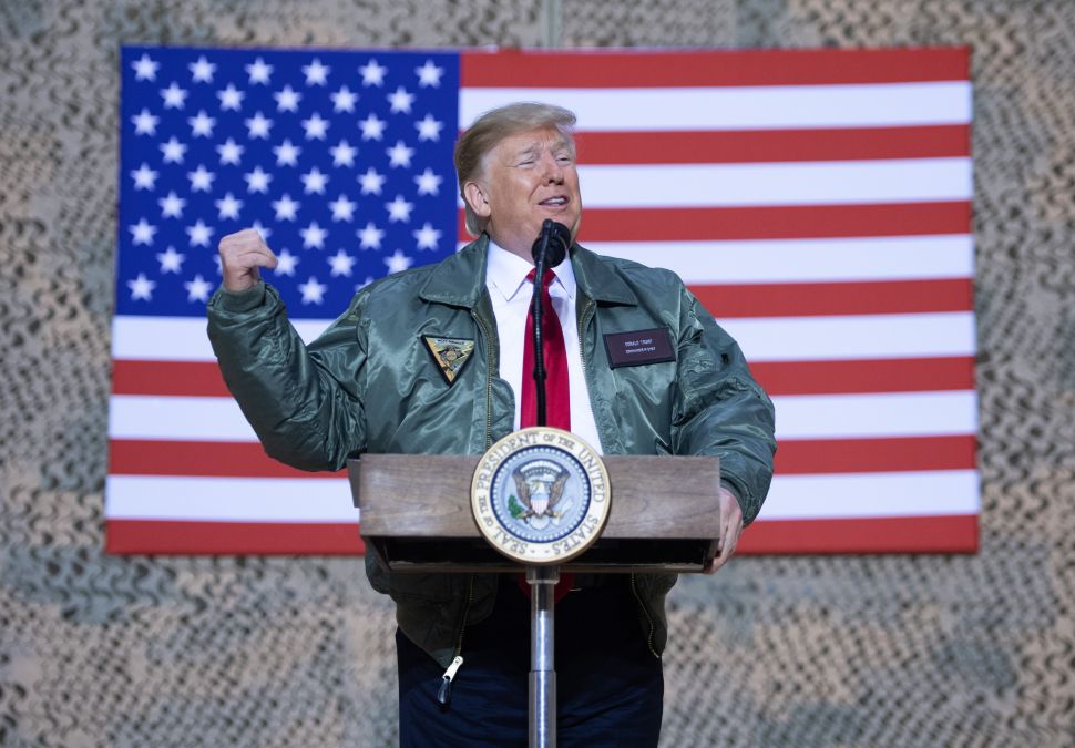 President Donald Trump speaks to members of the U.S. military.