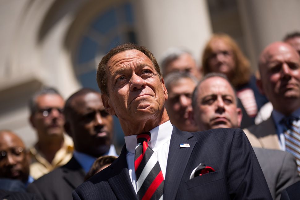 Joe Piscopo, actor and comedian, looks on outside of City Hall during a press conference and rally in support of the Christopher Columbus statue in Manhattan, August 24, 2017 in New York City.