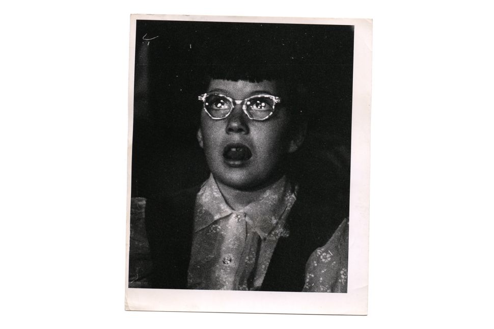 Close-up of a girl as she watches a circus performance, New York, New York, 1940s or 1950s.