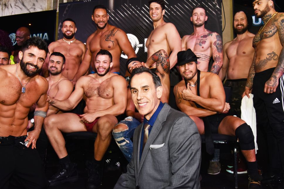 Hunk-O-Mania founder Armand Peri with strippers after a recent show at the Copacabana in New York City.