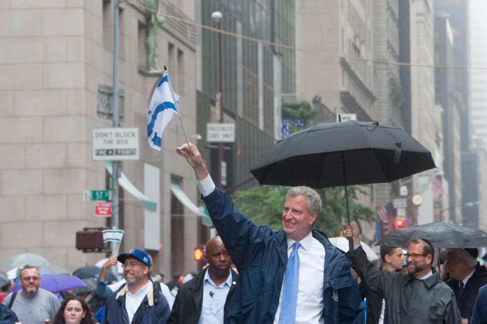 Mayor of New York City, Bill de Blasio marches in the Celebrate Israel Parade.