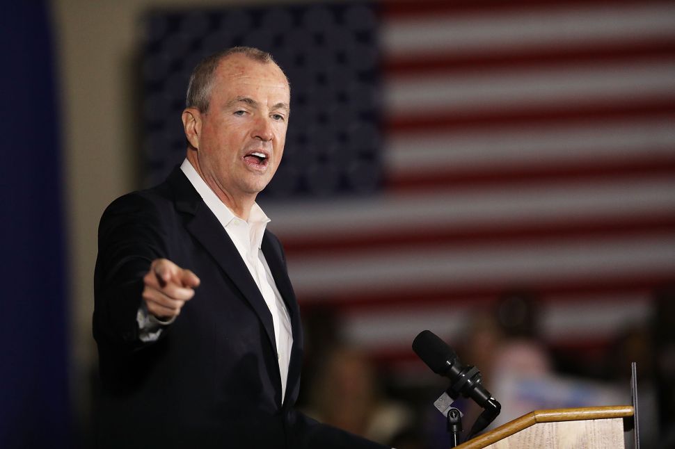 Al Alvarez worked as Gov. Phil Murphy's (pictured) campaign head of Muslim and Latino outreach.