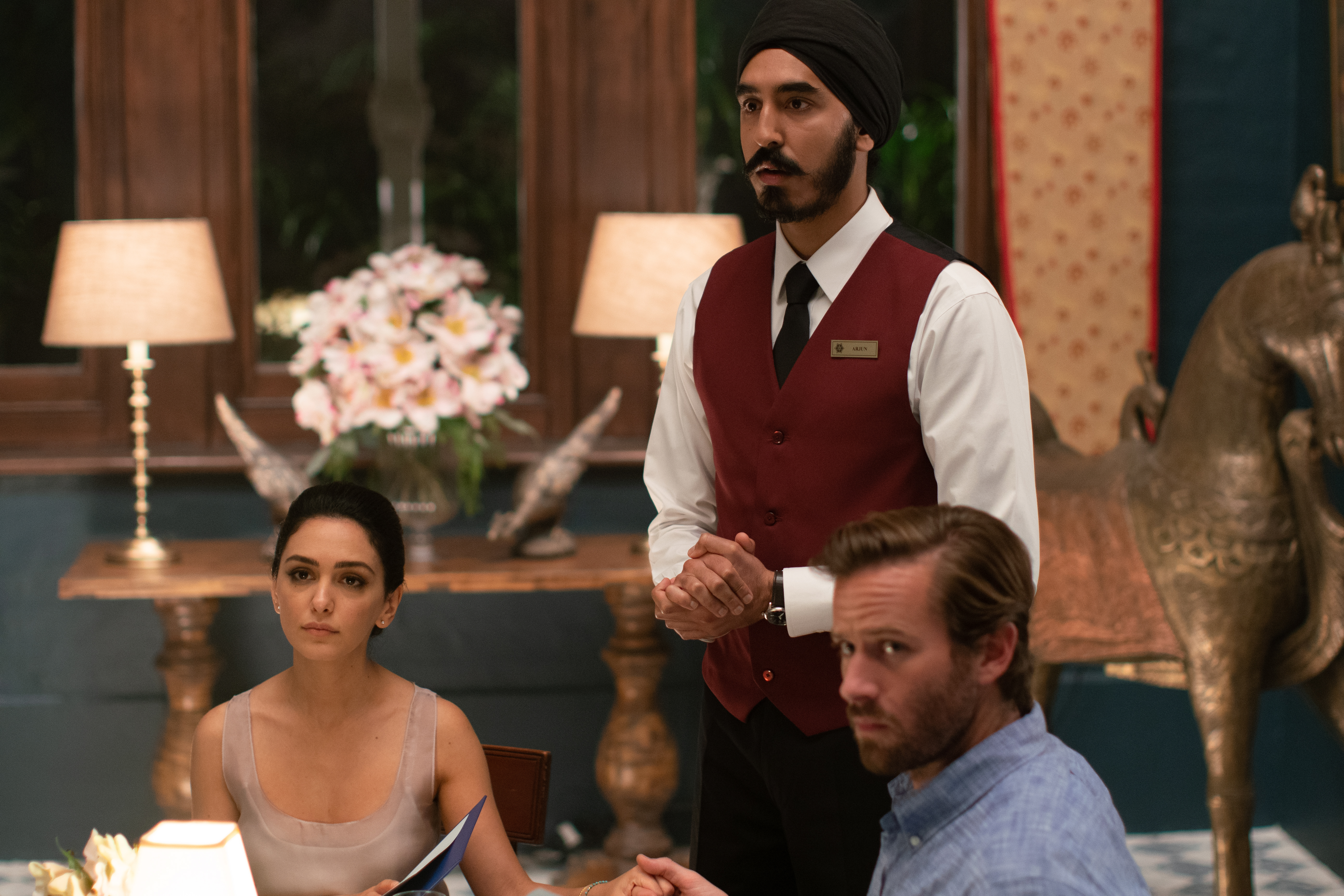 Nazanin Boniadi, Dev Patel and Armie Hammer in Hotel Mumbai.