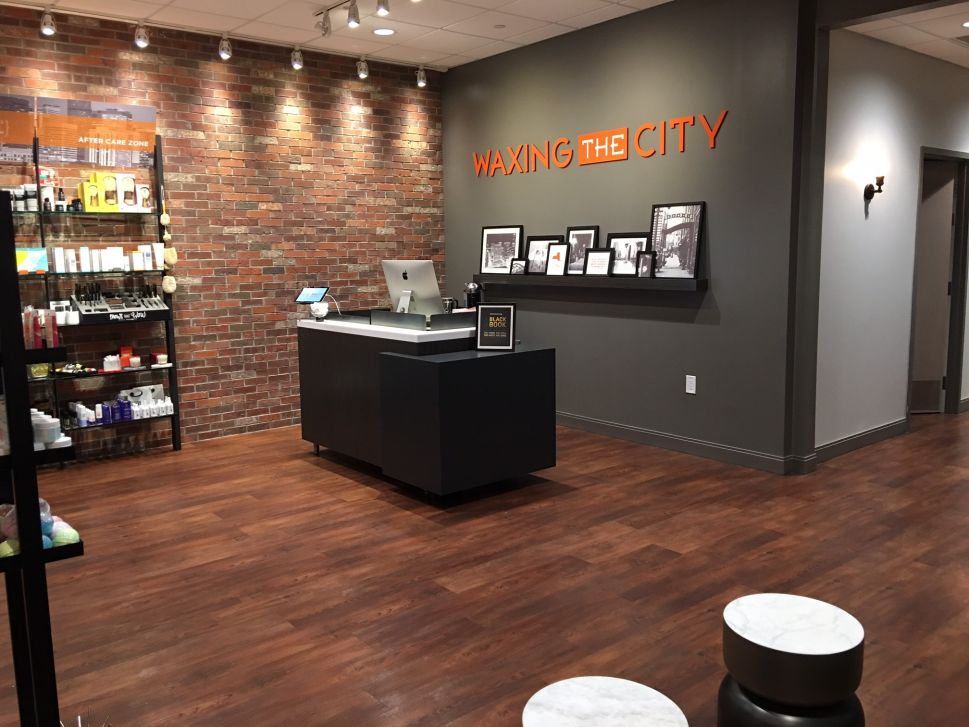 Inside the lobby of a Waxing the City location.