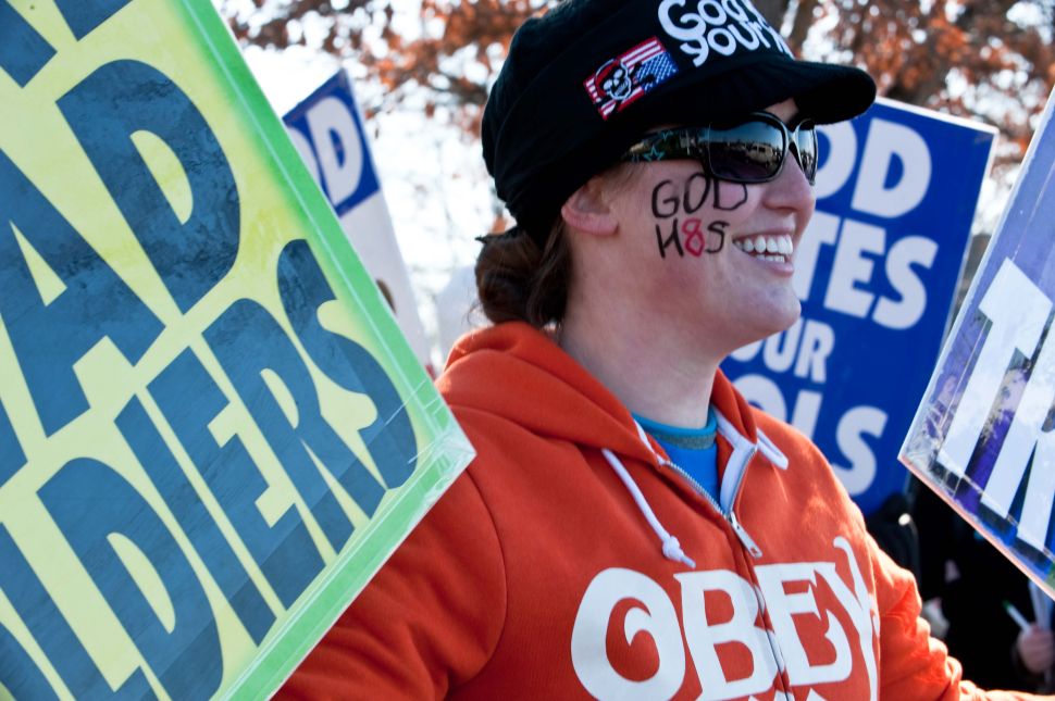 Megan Phelps-Roper participates in a Westboro Baptist Church protest across the street from Northwestern High School in Hyattsville, Maryland on March 1, 2011.