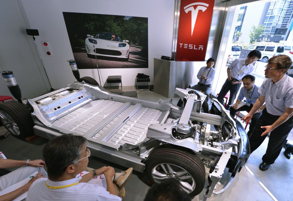 Batteries make up about half of an electric car's cost.
