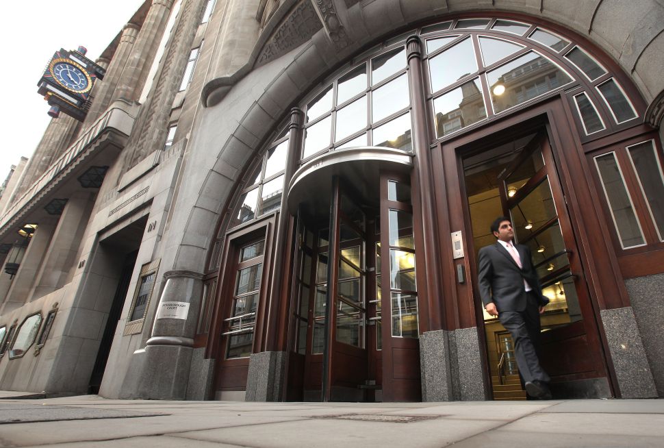 A man leaves the Goldman Sachs building in central London on January 21, 2010.